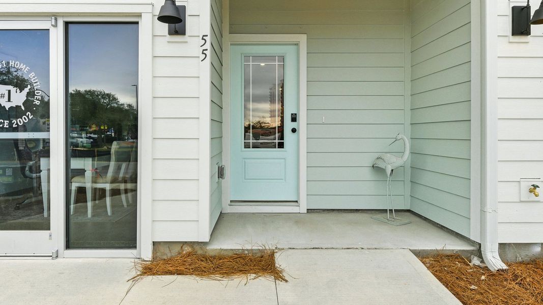 Exterior details and patio area of a home in Palm Street Townhomes, Destin (Image 2). Exterior details and patio area of a home in Palm Street Townhomes, Destin (Image 2).