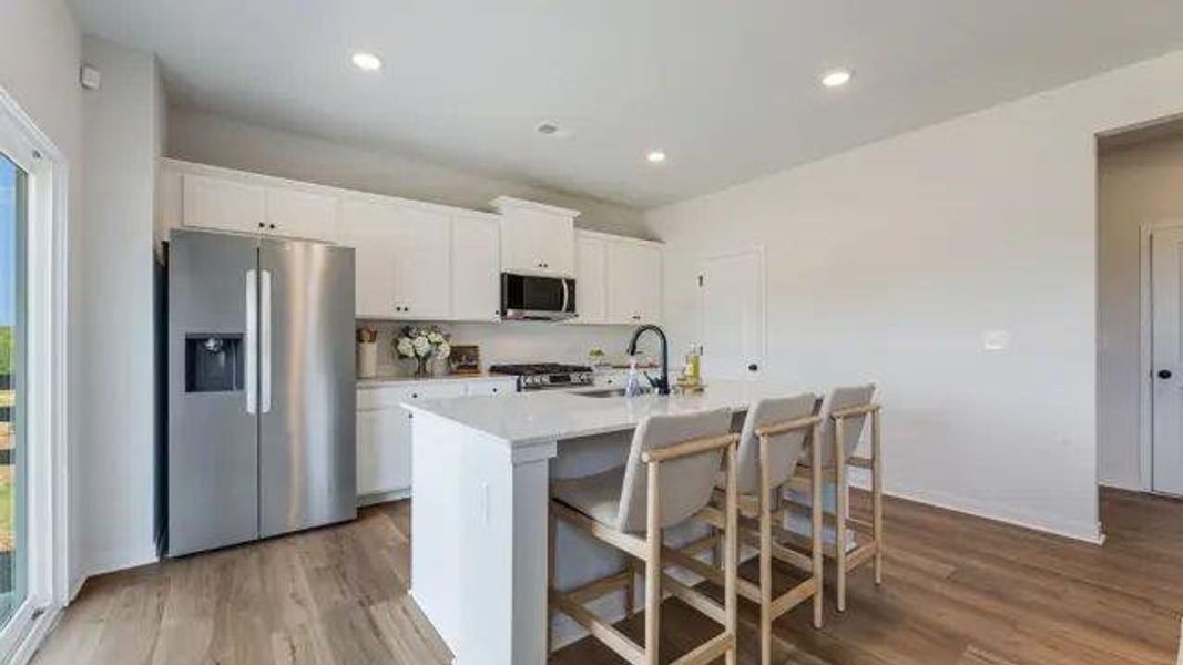 Furnished interior view inside a new home in Reserve at Gum Springs, Jefferson (Image 6).