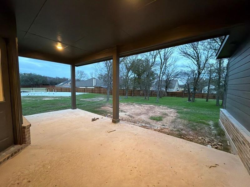 Exterior details and patio area of a home in Covenant Springs, Springtown (Image 2). Exterior details and patio area of a home in Covenant Springs, Springtown (Image 2).