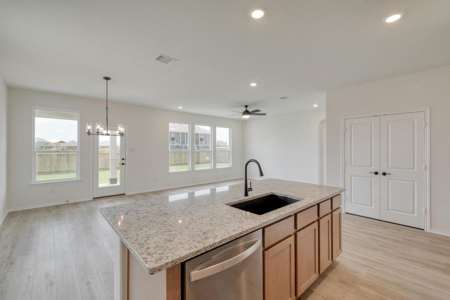Furnished interior view inside a new home in Mustang Valley, Manor (Image 12).