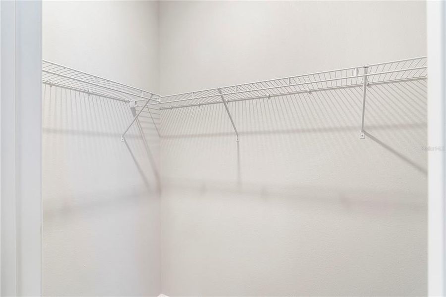 Spacious, unfurnished interior of a new home in Reunion Village, Kissimmee (Image 19).