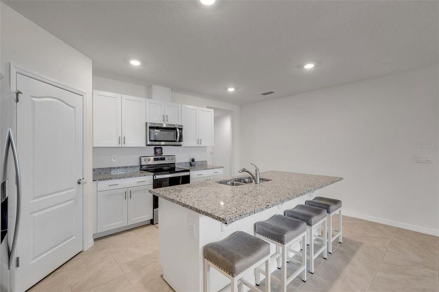 Furnished interior view inside a new home in Groveside at Ormond Station, Ormond Beach (Image 13).