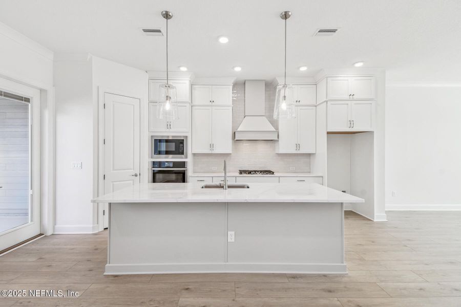 Furnished interior view inside a new home in Seven Pines 24' Rear Entry Townhomes, Jacksonville (Image 12).