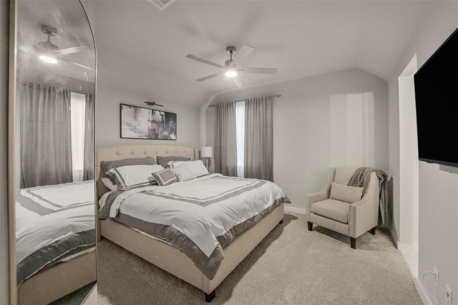Comfortable secondary bedroom perfect for family, guests, or a home office.