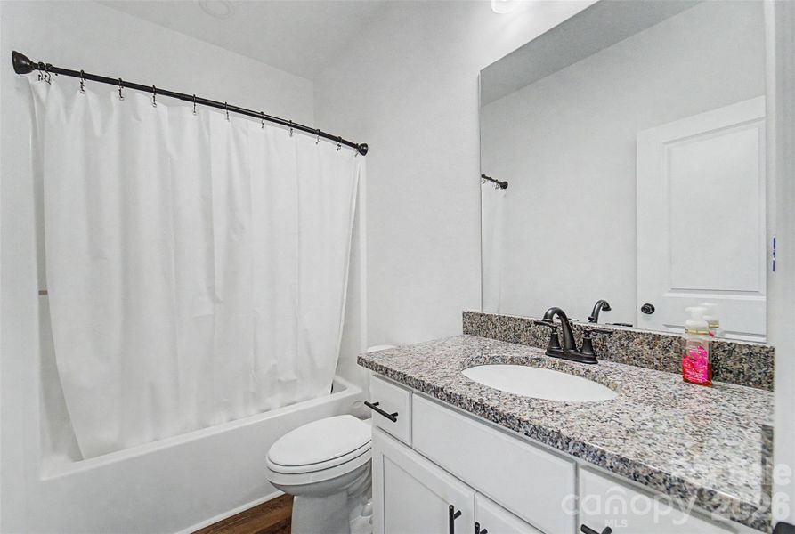 Furnished interior view inside a new home in , Waynesville (Image 13).