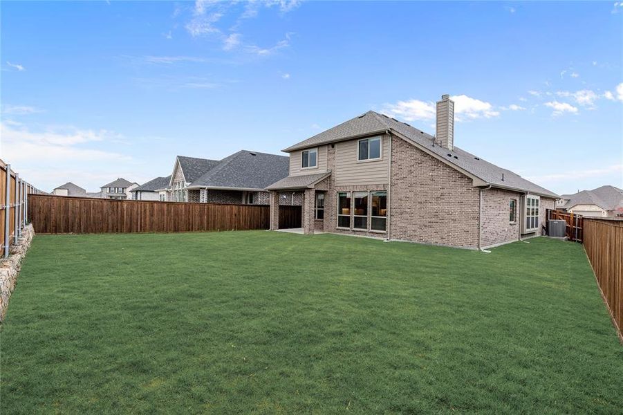 Exterior details and patio area of a home in Waterscape Classic 50s, Royse City (Image 23). Exterior details and patio area of a home in Waterscape Classic 50s, Royse City (Image 23).