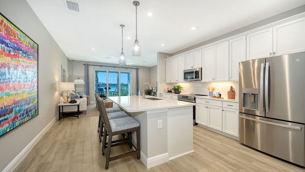 Representative furnished interior of a home built from the Avery by Neal Communities in SkySail, Naples (Image 18).