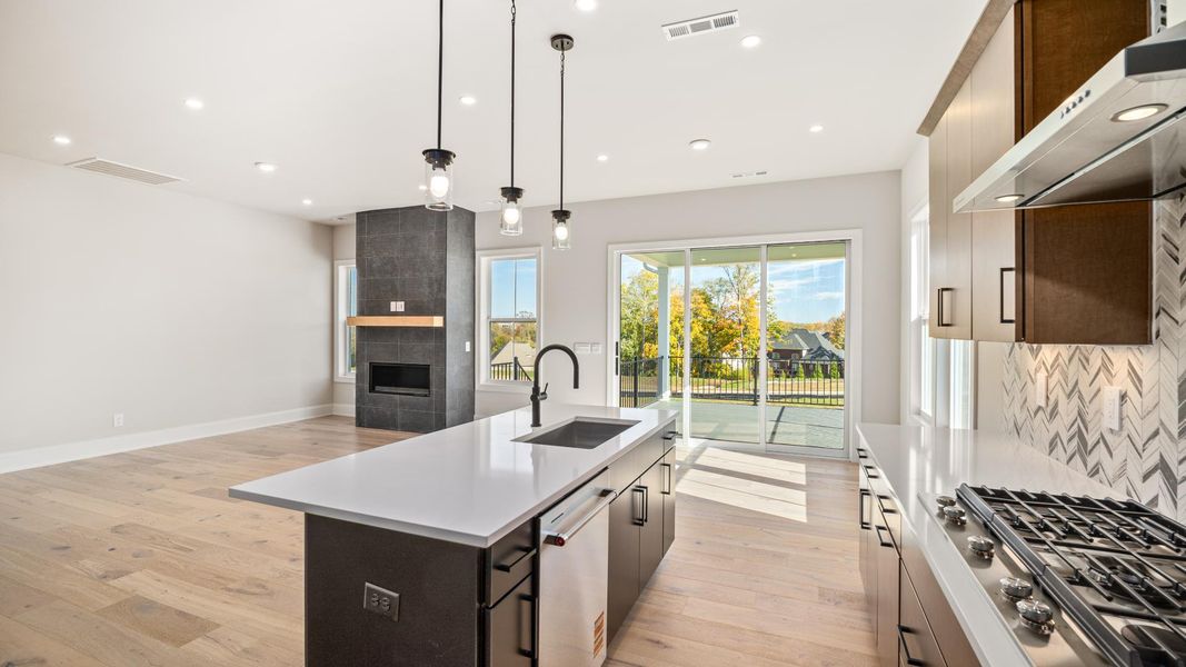 Stunning kitchen with casual dining area that leads out to covered deck Stunning kitchen with casual dining area that leads out to covered deck