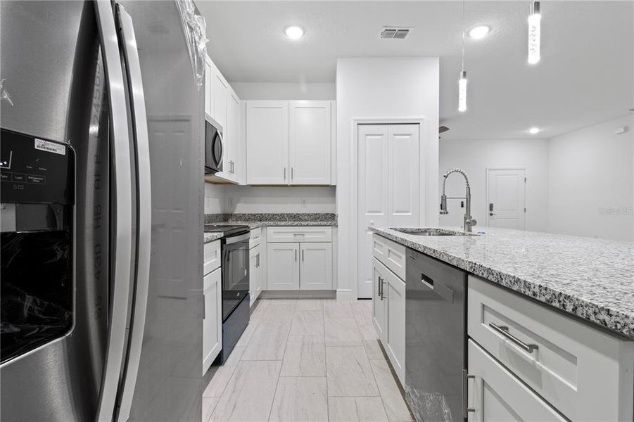 Furnished interior view inside a new home in , Citrus Springs (Image 13).