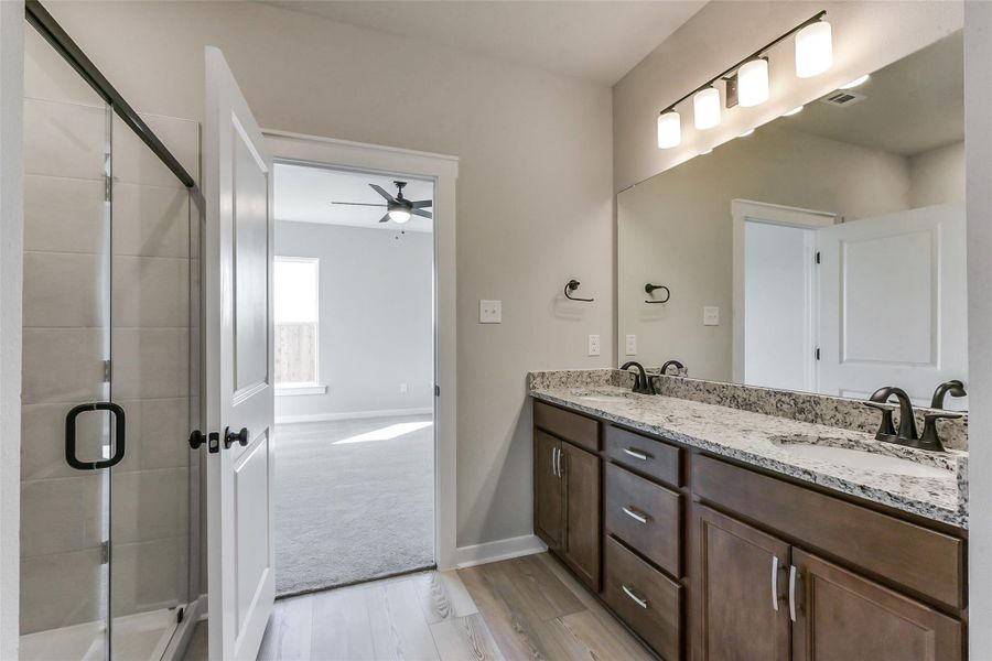 Furnished interior view inside a new home in Aldeana, Bonney (Image 14).