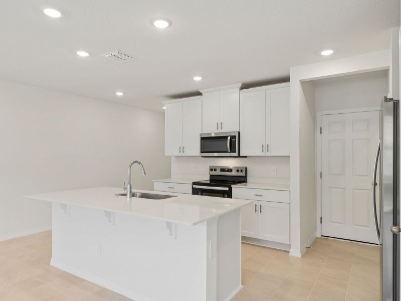 Furnished interior view inside a new home in The Meadow at Crossprairie Townes, St. Cloud (Image 4). Furnished interior view inside a new home in The Meadow at Crossprairie Townes, St. Cloud (Image 4).