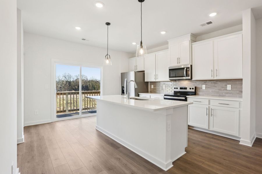 Furnished interior view inside a new home in Greystone - Highland Townhomes, Smyrna (Image 5).