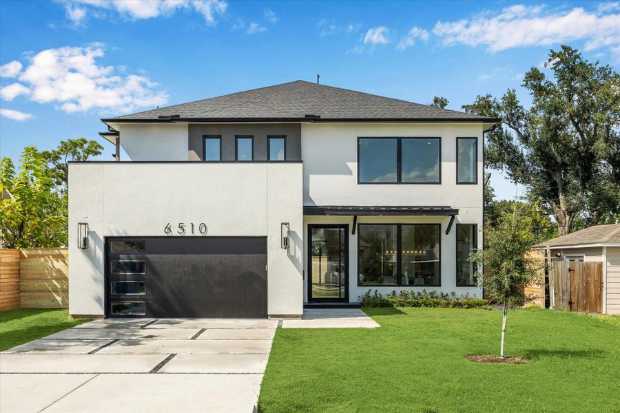 Welcome home! This contemporary exterior features clean lines, modern accents, and landscaped front yard. Welcome home! This contemporary exterior features clean lines, modern accents, and landscaped front yard.