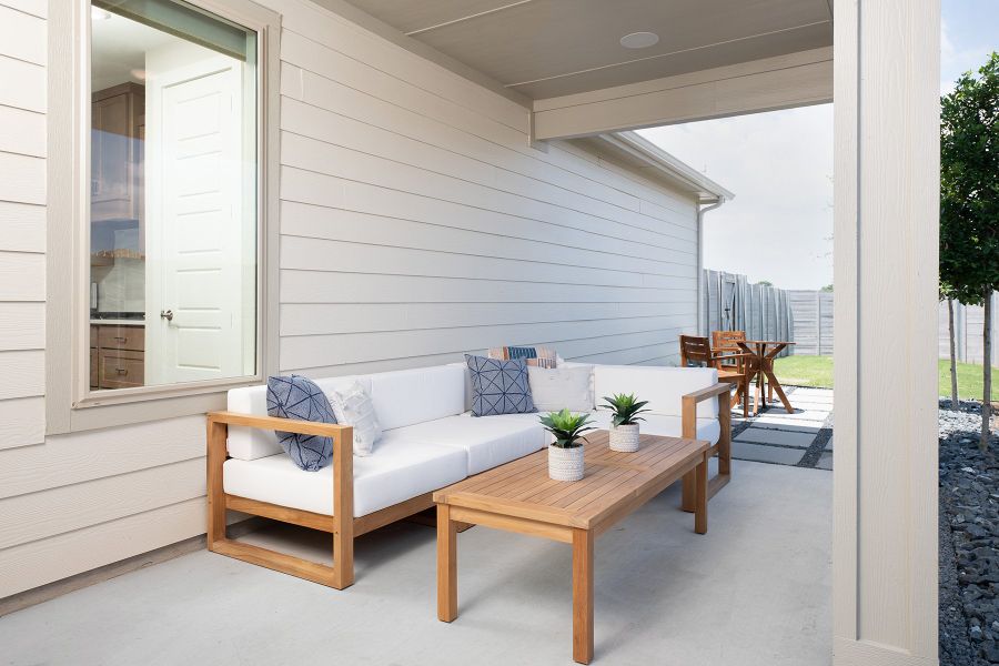 Exterior details and patio area of a home in Carriage Collection at Painted Tree, McKinney (Image 3). Exterior details and patio area of a home in Carriage Collection at Painted Tree, McKinney (Image 3).