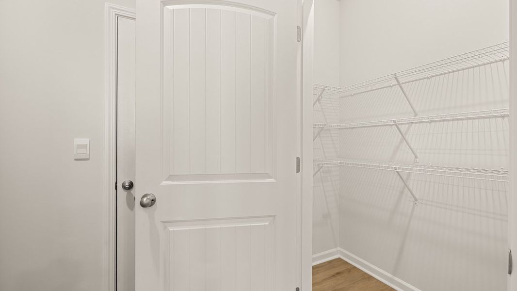 Representative unfurnished interior of a home built from the Mansfield by D.R. Horton in Northwoods at Mirror Lake, Villa Rica (Image 18). Representative unfurnished interior of a home built from the Mansfield by D.R. Horton in Northwoods at Mirror Lake, Villa Rica (Image 18).