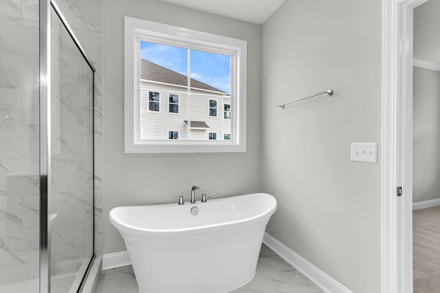 Furnished interior view inside a new home in Tidewater at Lakes of Cane Bay, Summerville (Image 10).