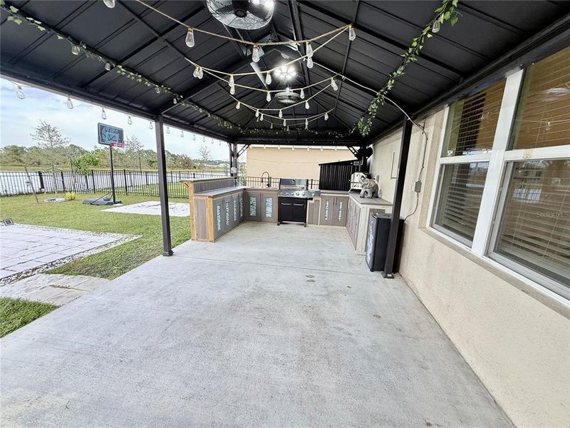 Exterior details and patio area of a home in Harmony West, St. Cloud (Image 31).