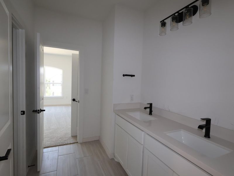 Furnished interior view inside a new home in Edgewood, Leander (Image 7). Furnished interior view inside a new home in Edgewood, Leander (Image 7).