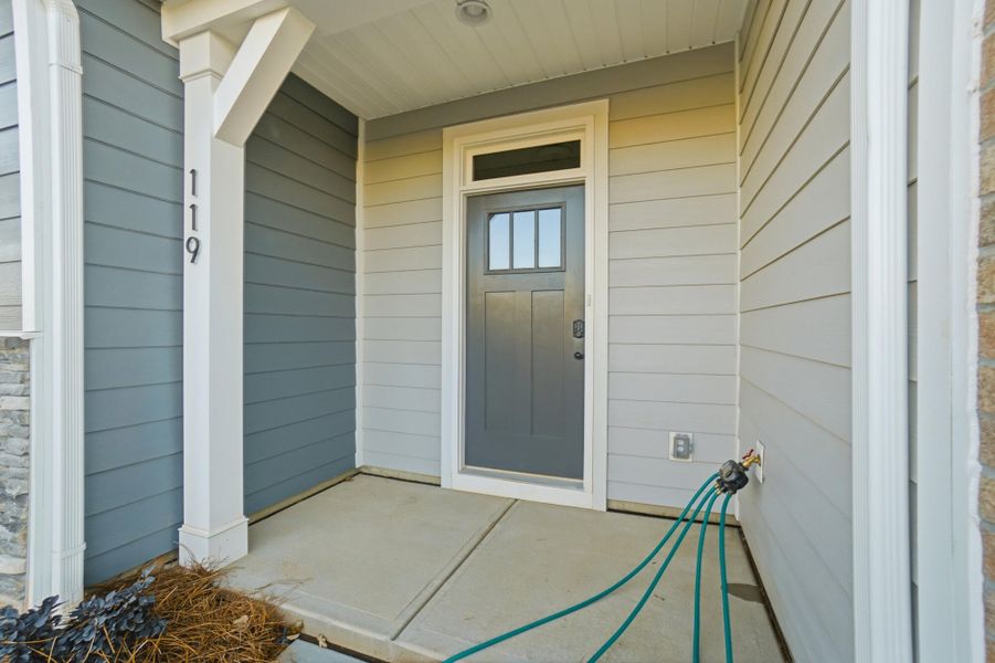 Exterior details and patio area of a home in Blythe Mill Townhomes, Waxhaw (Image 3). Exterior details and patio area of a home in Blythe Mill Townhomes, Waxhaw (Image 3).