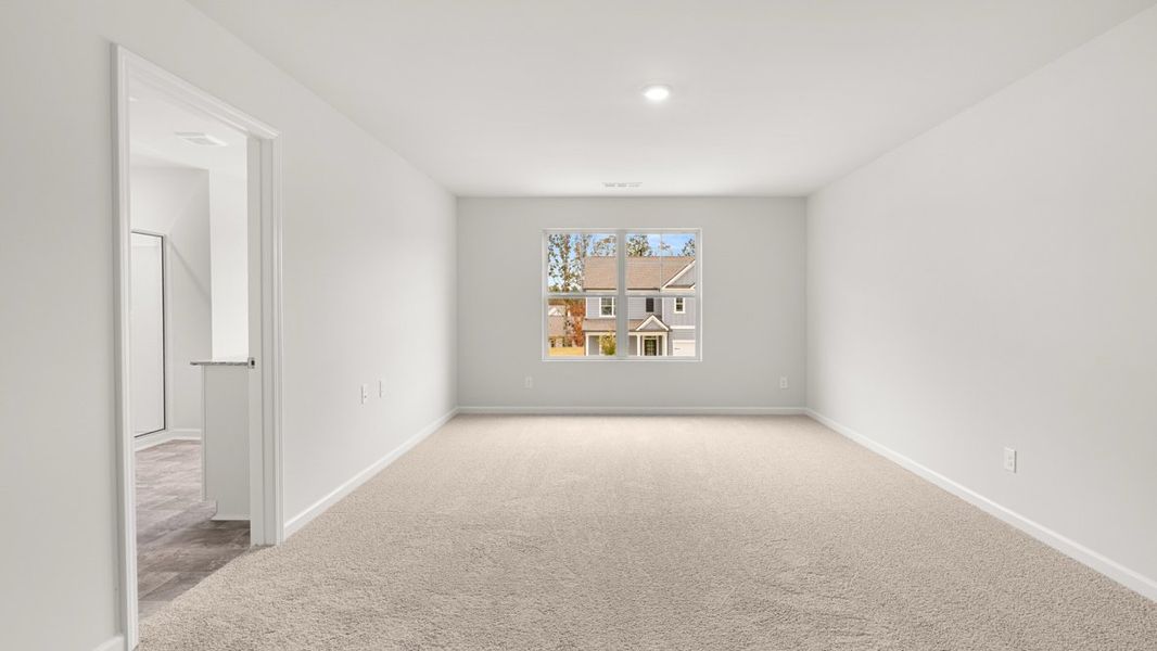 Representative unfurnished interior of a home built from the Hayden by D.R. Horton in Liberty Crossing, Braselton (Image 24).