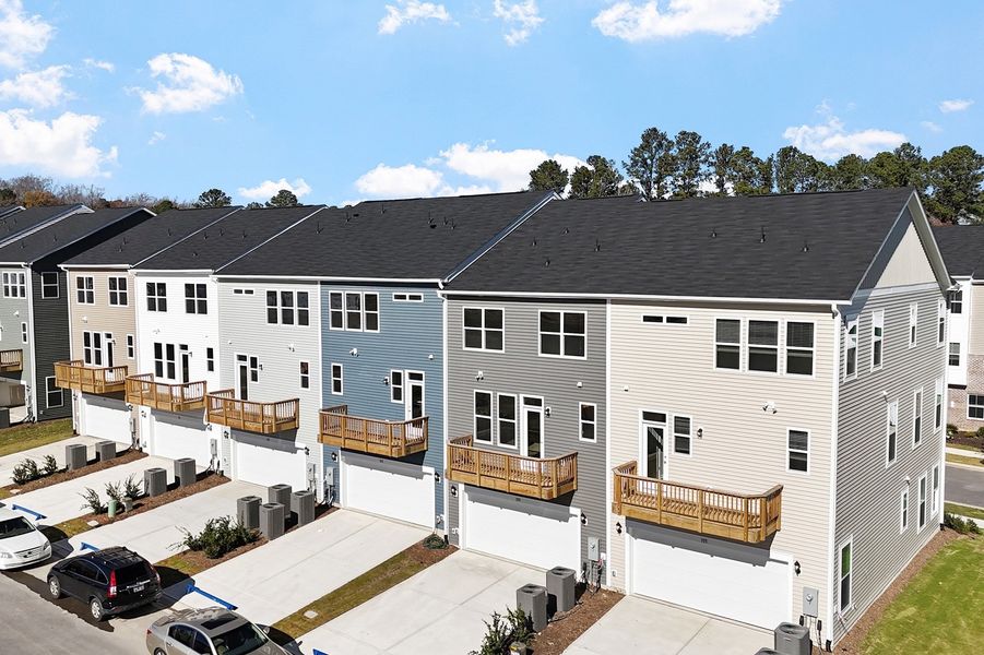 Exterior details and patio area of a home in Renaissance at White Oak, Garner (Image 4).