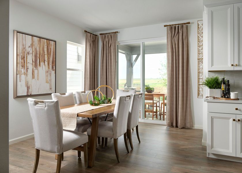 Furnished interior view inside a new home in The Aurora Highlands, Aurora (Image 6).