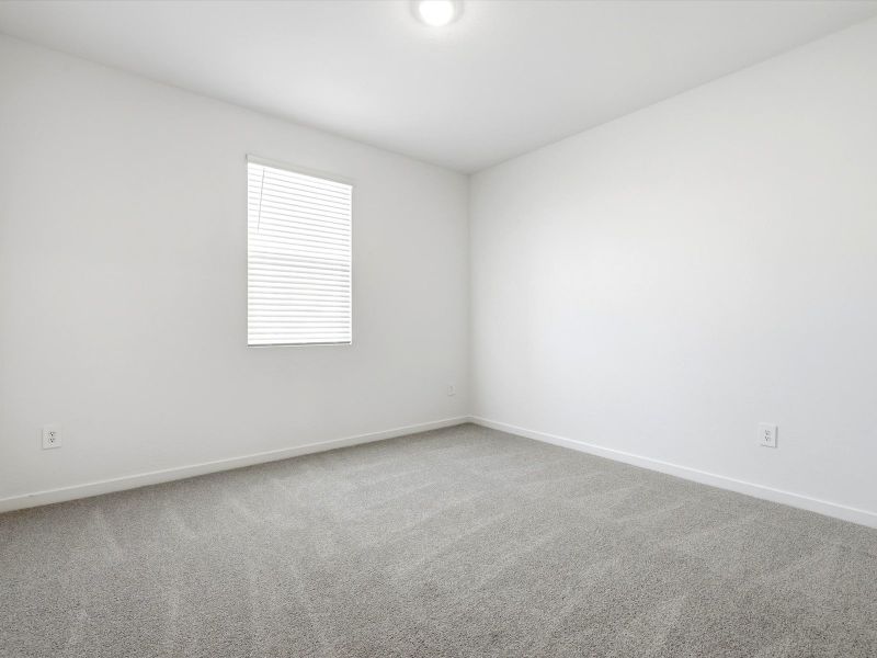 Spacious, unfurnished interior of a new home in Mountain View Estates Signature Series, Buckeye (Image 12).