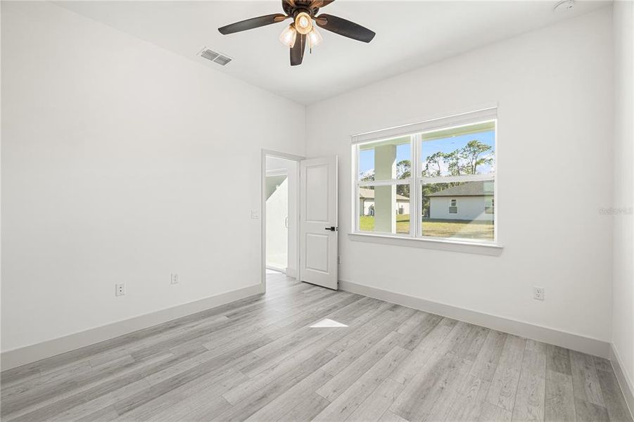 Spacious, unfurnished interior of a new home in , Port Charlotte (Image 29).