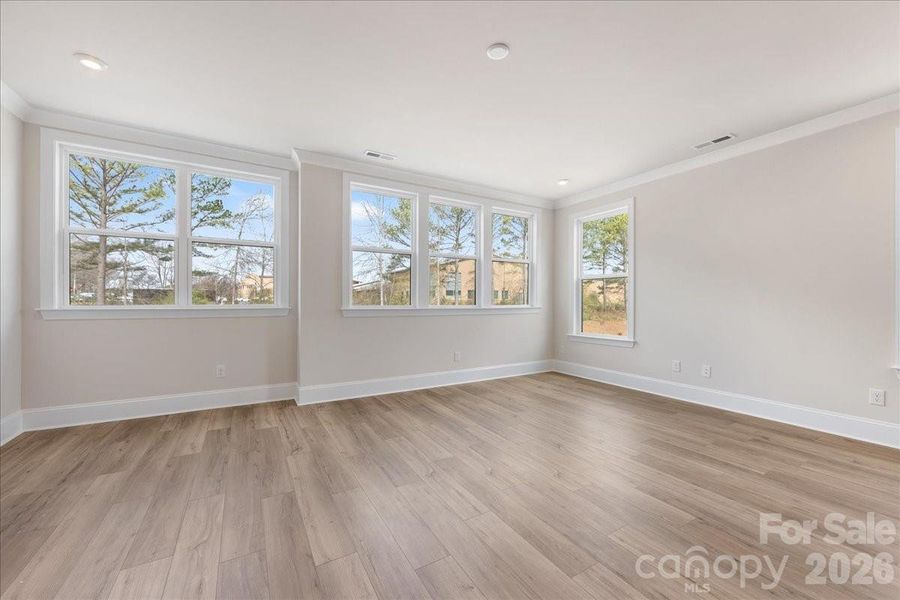 Light-filled living room with end unit windows