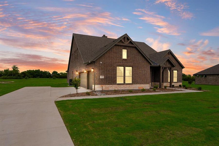 Front exterior of a new home in Fannin Ranch, Leonard, TX, highlighting curb appeal (Image 21). Front exterior of a new home in Fannin Ranch, Leonard, TX, highlighting curb appeal (Image 21).