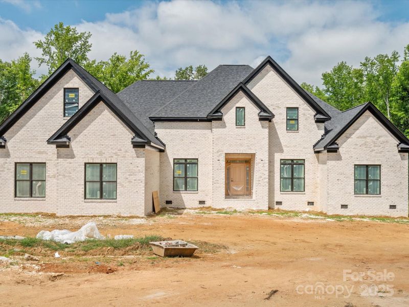 Front exterior of a new home in , Waxhaw, NC, highlighting curb appeal (Image 12).