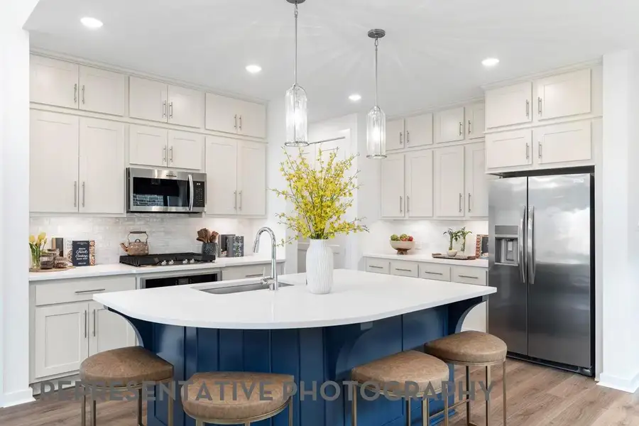 Furnished interior view inside a new home in Bridgeland, Cypress (Image 5).