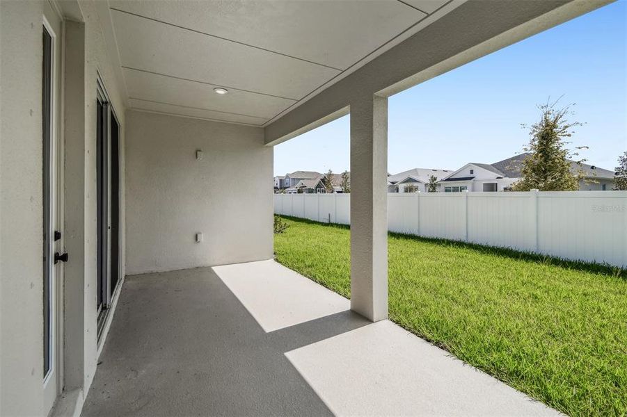 Exterior details and patio area of a home in The Peninsula at Rhodine Lake, Riverview (Image 29). Exterior details and patio area of a home in The Peninsula at Rhodine Lake, Riverview (Image 29).