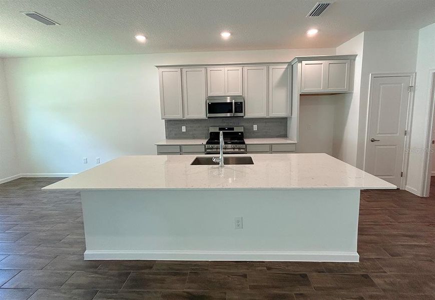 Furnished interior view inside a new home in Summerbrooke, Mount Dora (Image 4). Furnished interior view inside a new home in Summerbrooke, Mount Dora (Image 4).