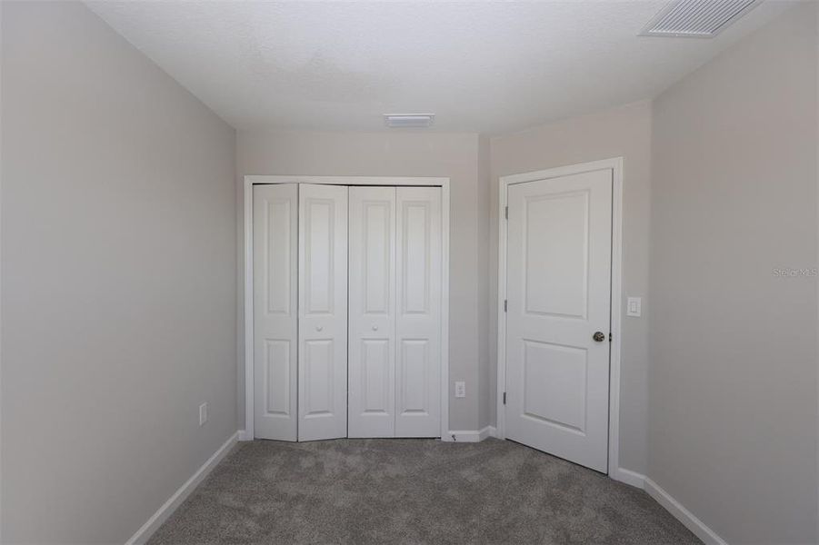Spacious, unfurnished interior of a new home in Tyson Ranch, Orlando (Image 23).