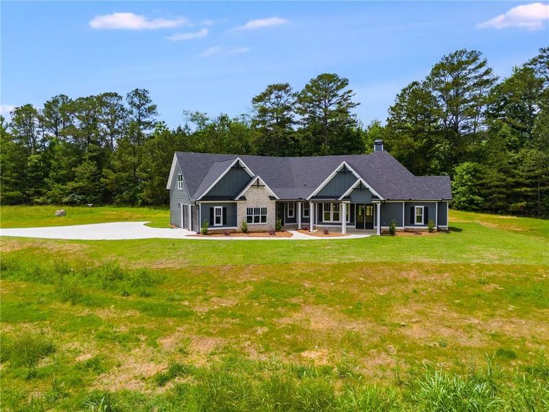 Front exterior of a new home in The Meadows at Lake Circle, Buchanan, GA, highlighting curb appeal (Image 26).
