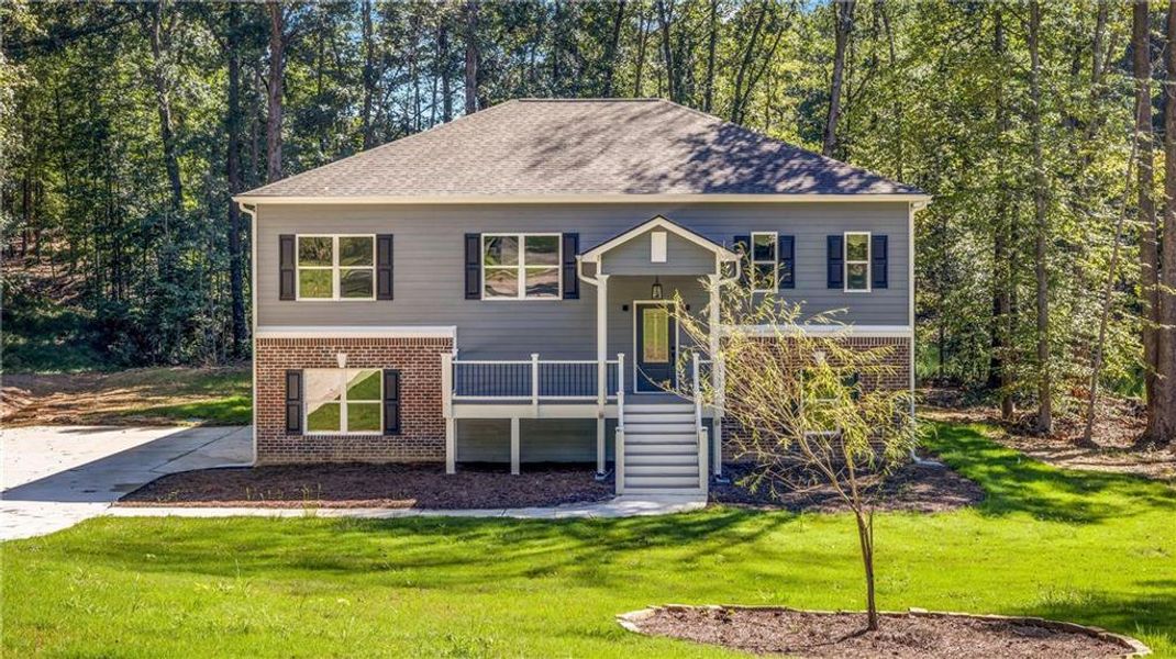 Front exterior of a new home in , Fayetteville, GA, highlighting curb appeal (Image 1).