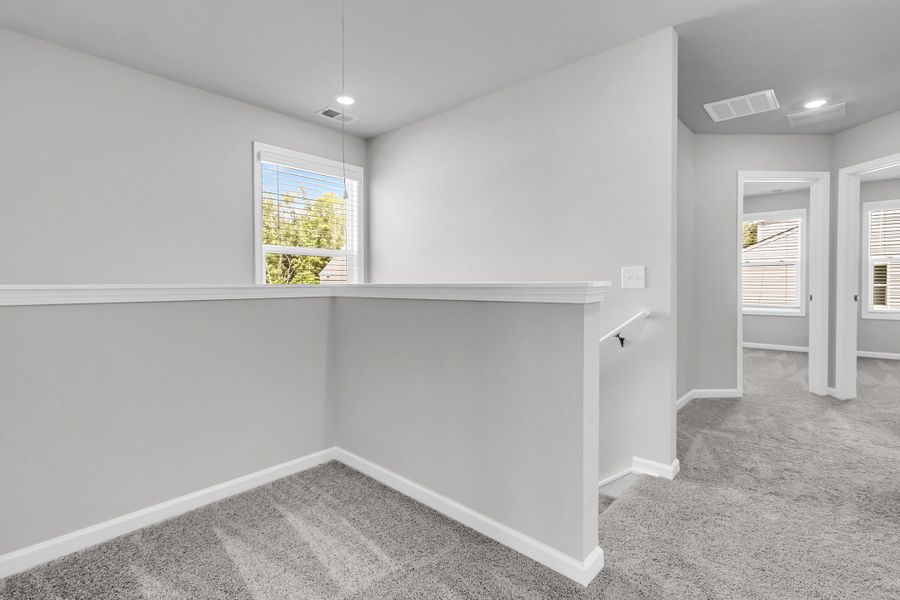 Spacious, unfurnished interior of a new home in Central Creek, Goose Creek (Image 53).