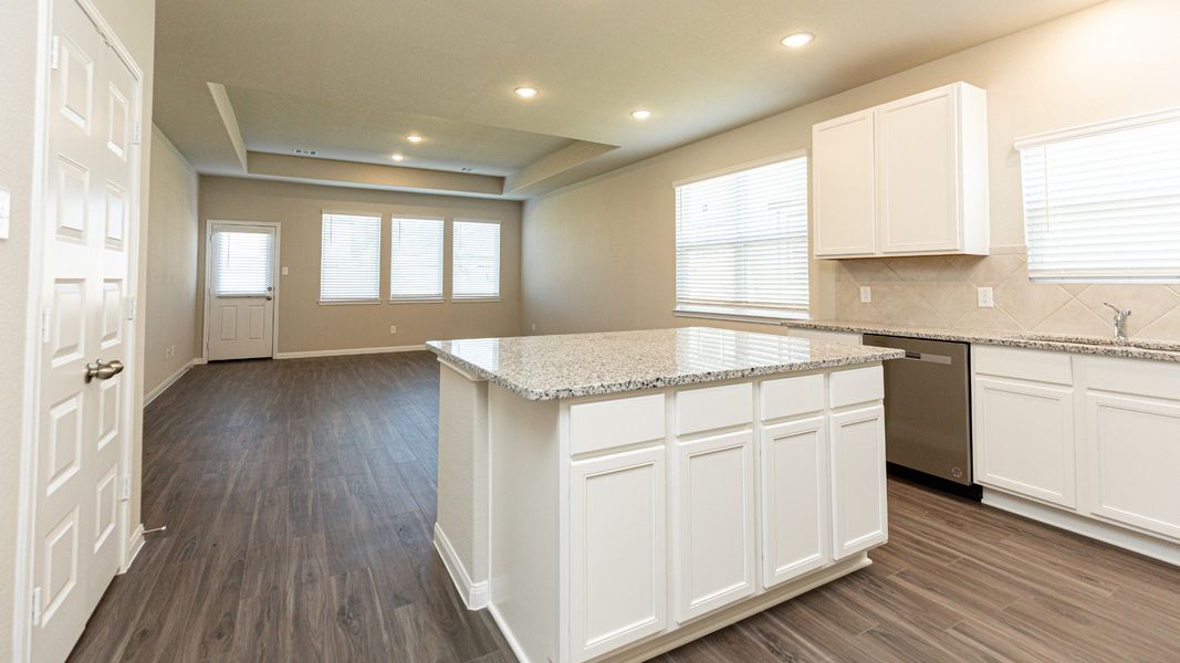 Kitchen to Dining Area and Family Room