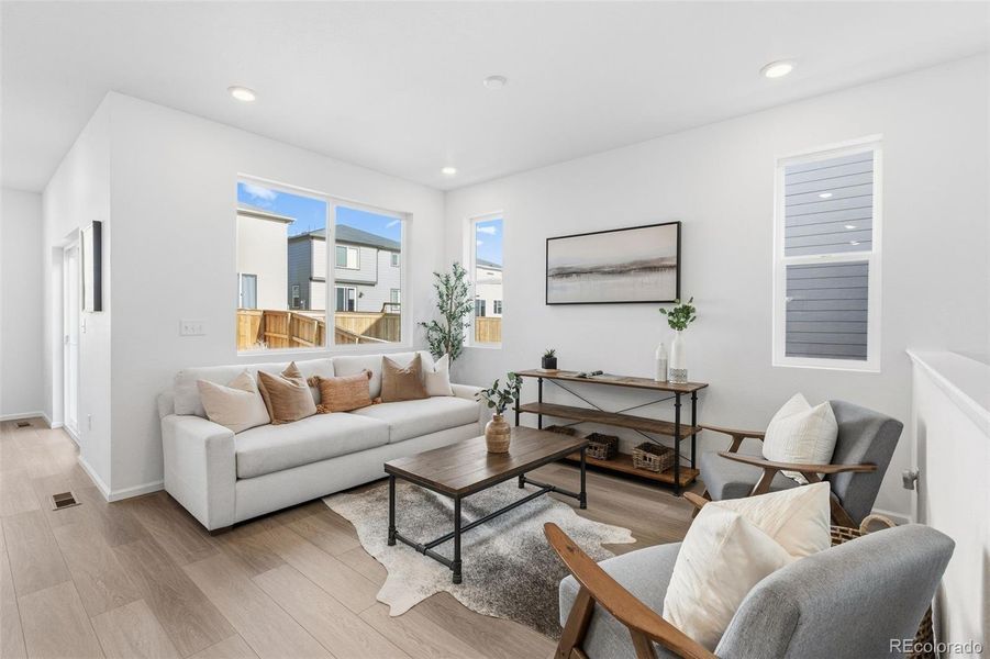 Furnished interior view inside a new home in The Cottages Collection at Ridgeline Vista, Brighton (Image 17).
