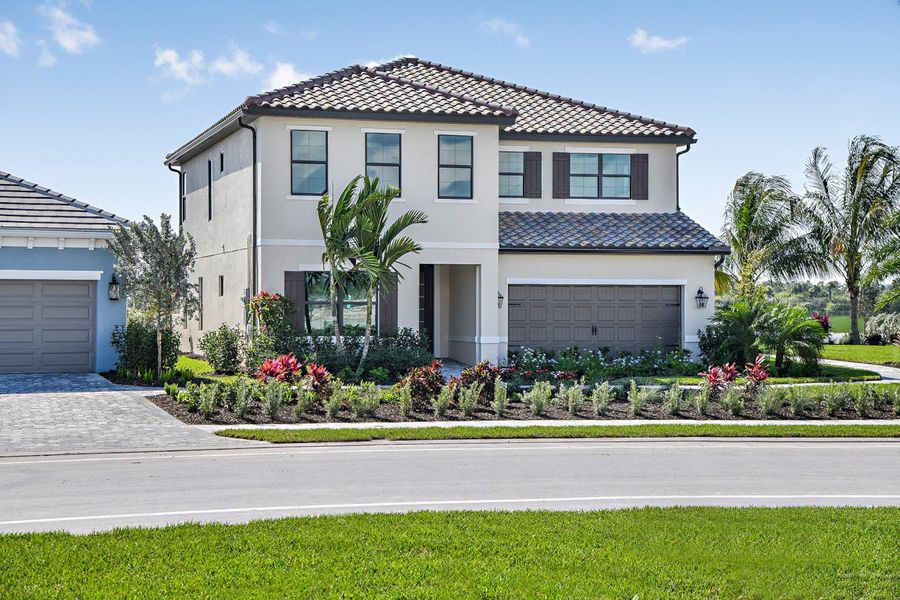 Representative exterior photo of a completed home built from the Artistry by Neal Communities in SkySail, Naples, FL (Image 22).