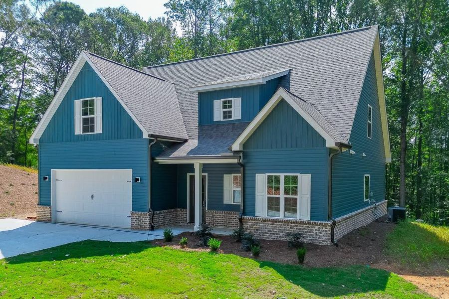 Front exterior of a new home in , Jefferson, GA, highlighting curb appeal (Image 22).