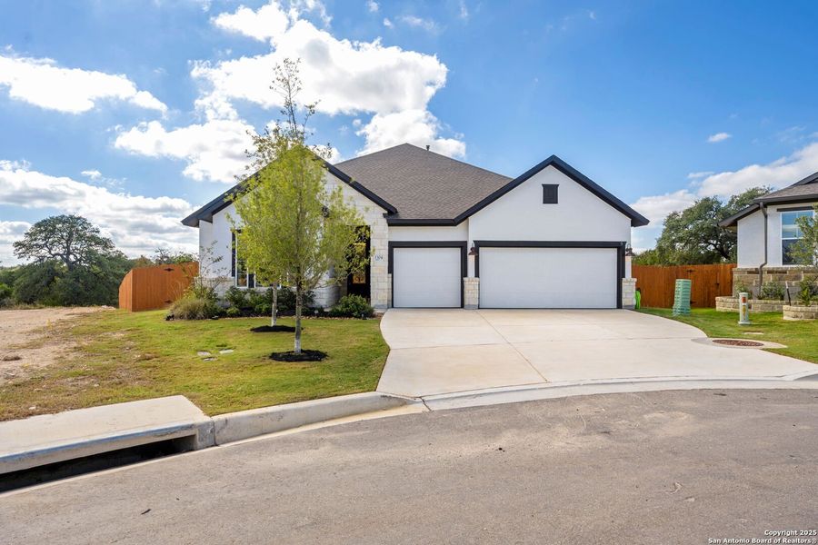 Front exterior of a new home in Meyer Ranch – Legacy Series, New Braunfels, TX, highlighting curb appeal (Image 23).