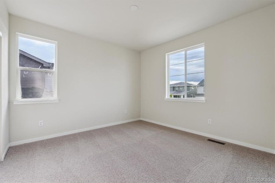 Spacious, unfurnished interior of a new home in Floret Collection at Parkdale Commons, Lafayette (Image 17).