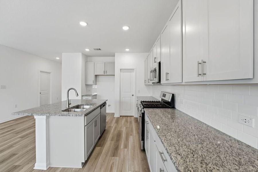 Furnished interior view inside a new home in Lisso, Pflugerville (Image 6).