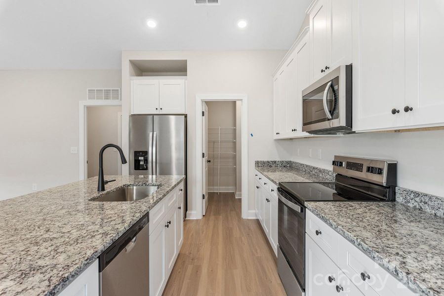 Furnished interior view inside a new home in Ascot Woods, Charlotte (Image 7).