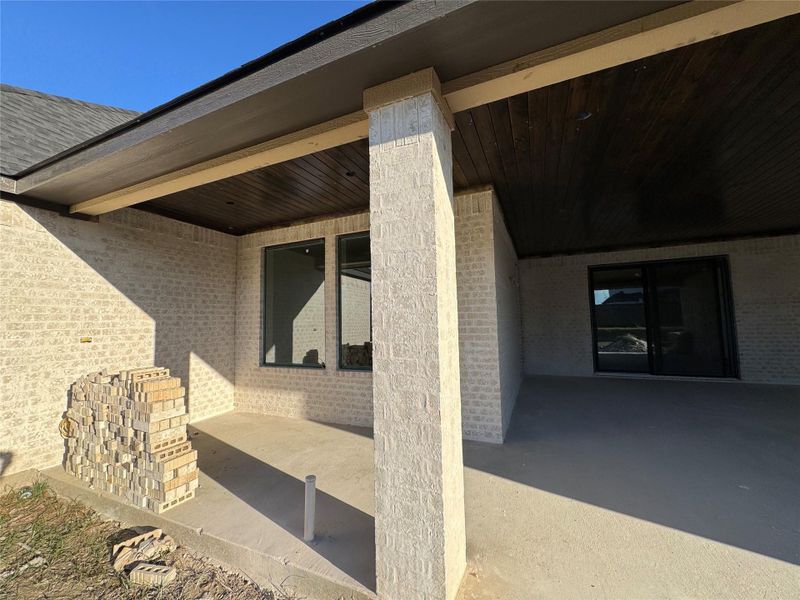 Exterior details and patio area of a home in , College Station (Image 2).