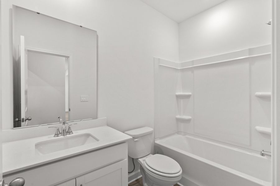Furnished interior view inside a new home in Waterside - Boardwalk Series, Longs (Image 9).