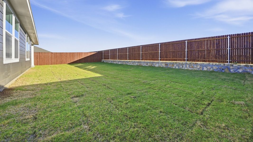Exterior details and patio area of a home in Windrose, Pilot Point (Image 11).