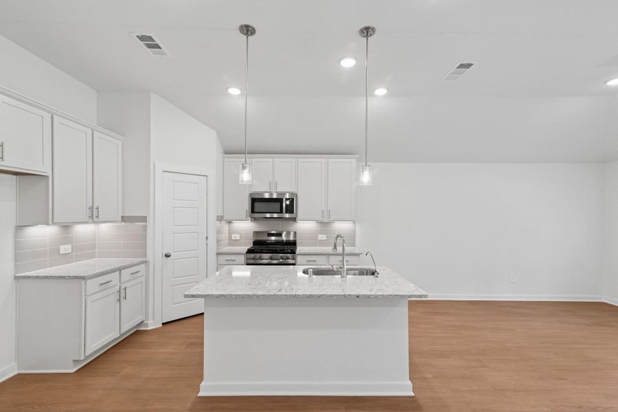 Furnished interior view inside a new home in Pinewood at Grand Texas, New Caney (Image 7).